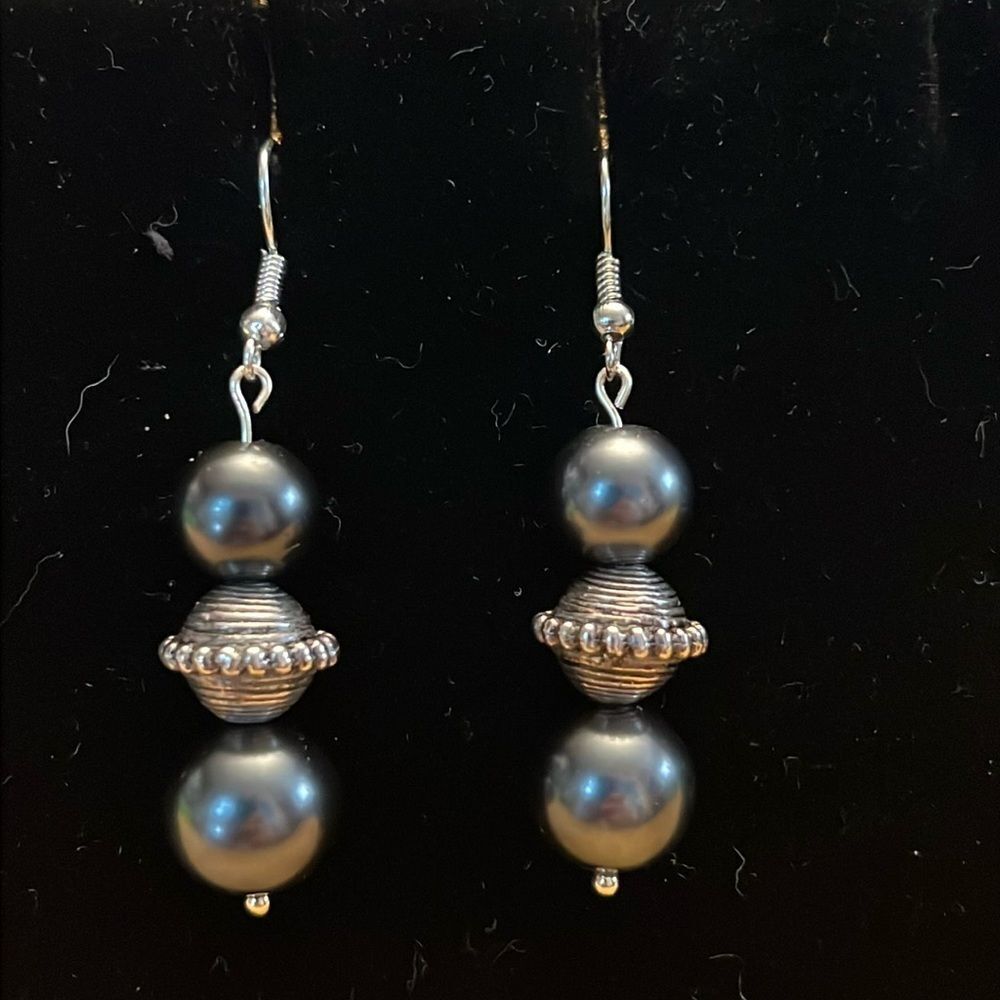 Handcrafted silver tone earrings with dark grey and silver beading.